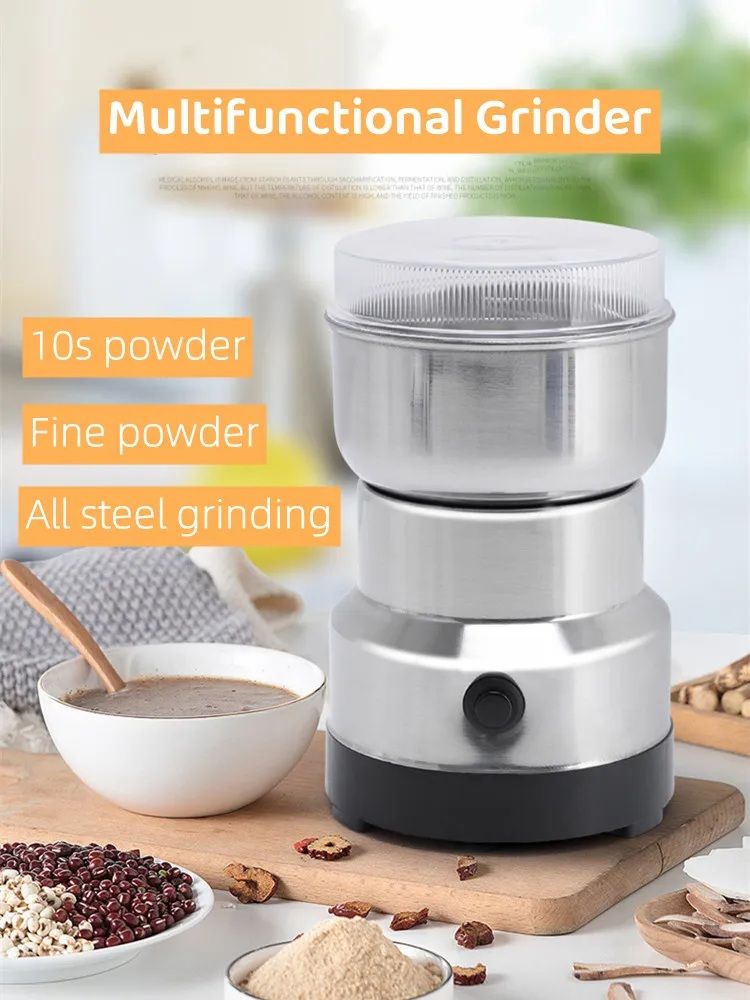 Multifunctional grinder with ingredients and a bowl of ground powder on a wooden surface.